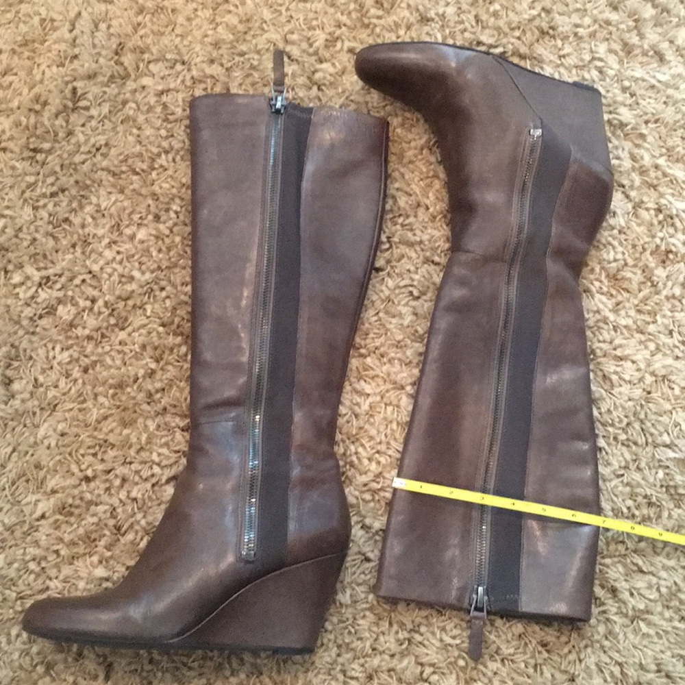 Below the knee wedge leather boots